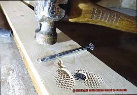 liquid nails adhere wood to concrete