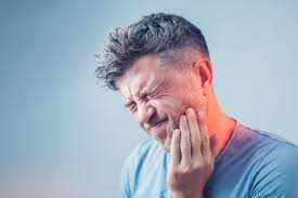 signs that a tooth infection is