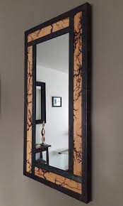 metal framed wall mirror with