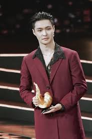 As he leaves the band to enlist in the south korean military. Exo S Lay Hauled Awards At Various Year End Music Shows In China