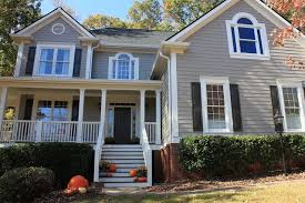 Intellectual grey 7045 undertones : A Gentile Family Exterior House Renovations Exterior Paint Colors For House House Paint Exterior White Exterior Houses