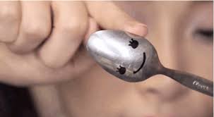 apply eye makeup using a spoon