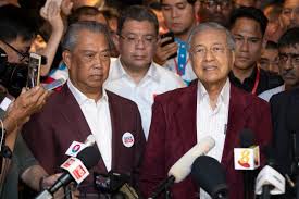 Muhyiddin was appointed caretaker prime minister until a successor was found. 46itbpb2jidr M