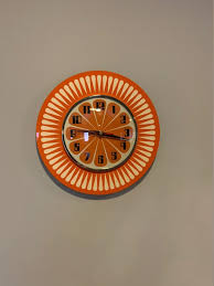 Sunburst Orange Formica Wall Clock
