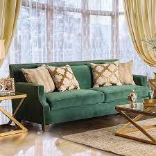 emerald green and gold sofa on 56