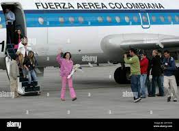 Colombian politician Clara Rojas (C) waves after her arrival at Bogota  airport January 13, 2008. The Revolutionary Armed Forces of Colombia, or  FARC, rebels on January 10 freed Colombian politicians Rojas and