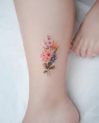 Family birth month flowers tattoo. 25 Pretty Birth Flower Tattoos And Their Symbolic Meaning