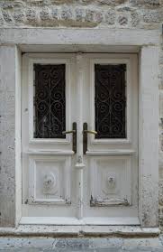 Old Glass Paneled White Wooden Door