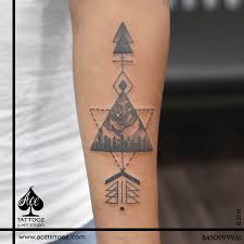 arrow travel tattoo design embark on