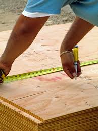 how to lay a plywood suloor on cement