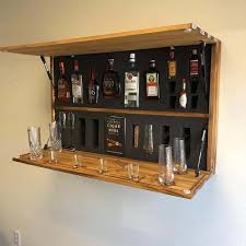 So we hunted around to find some of the coolest diy liquor cabinets out there. Speakeasy Vault Lets You Lock Away Your Whiskey In Plain Sight The Whiskey Wash