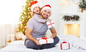 Image result for dad with Christmas Gifts opening presents