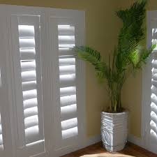 plantation shutters or curtains which