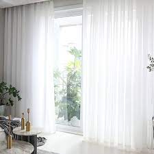 hang sheer curtains on a bed canopy