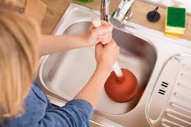 unclog kitchen sink stock photos