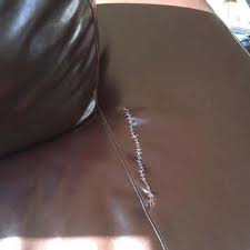 sched seam on ripped sofa cushion