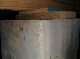 shims placed under floor joists