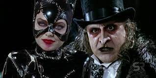 The penguin, now heavily bleeding, surfaces from the water as blood gushes from his nose and mouth. Tim Burton S Original Batman Returns Had Weird Penguin Catwoman Team Up