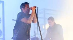 nine inch nails reunite with former