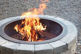 21 Stone Fire Pits To Spark Ideas For
