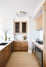 the return of natural wood kitchen cabinets
