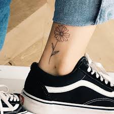 In some cultures, daisies are the symbol of calm, happiness, peace, and playfulness. Daisy Tattoo On The Ankle Tattoogrid Net