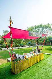 yellow and pink food stall with fls