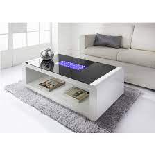 Cheap and affordable glass coffee tables that will give you all the function of a regular coffee table, but appear to take up way less space. Matrix Black And White High Gloss Coffee Table With Blue Led Lighting