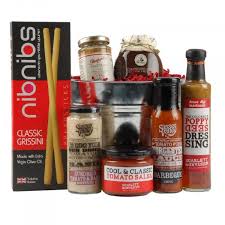 Our hampers are packed full of treats perfect for the foodie in your life. The Bbq Bucket Nibnibs Original Grissini 125g Mrs Bridges Caramelised Onion Garlic Chutney 220g Sussex Valley Bb Food Gift Baskets Flavors Food Hampers