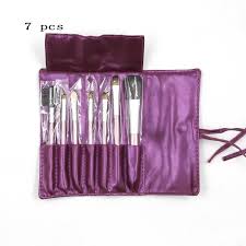 purple make up brushes leather bag