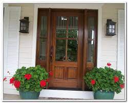wooden front doors with glass panels