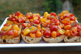 In this easy bruschetta recipe, tomatoes, garlic, olive oil, and fresh basil top slices of grilled country bread. Barefoot Contessa Providence Design Blog