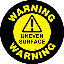 warning uneven surface visual
