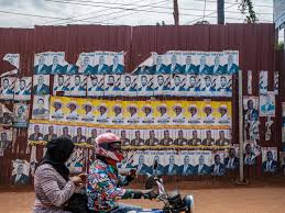 Elections billboards for uganda's president yoweri museveni and bobi wine are seen on a street in kampala. Nuhbyfismpcpcm