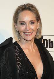 The hollywood star, 63, looked a million dollars as she dazzled in a vibrant bright yellow two. Sharon Stone 63 Reveals Surgeon Enhanced Her Bust Without Consent