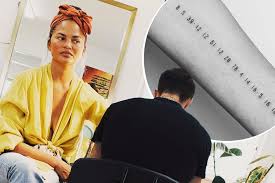 'in a way it saved me'. Chrissy Teigen S New Tattoo Slammed For Strong Holocaust Vibes