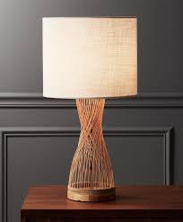 Natural Light Woven At An Angle Natural Fibers Form Lamp With Down To Earth Style Tapered Center Creates Cinched Si Modern Table Lamp Table Lamp Rattan Lamp