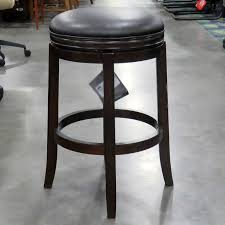 Ashley furniture sells affordable furniture available in varying colors, styles and materials. Ashley Furniture Porter Bar Height Swivel Stool Office Barn