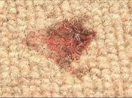 how to take candle wax off a carpet