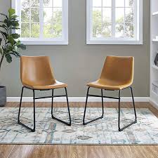 A tall arched back has a cover of lighter brown microfibre. Amazon Com We Furniture 18 Industrial Faux Leather Kitchen Dining Chair Set Of 2 Light Brown Brown Dining Chairs Faux Leather Dining Chairs Dining Chairs