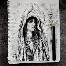 hooded gypsy with metal makeup