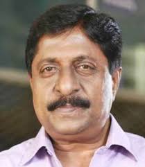 Neel malar kaavil by : Sreenivasan Hospitalised After Feeling Discomfort At Airport After Check In Sreenivasan Admitted In Aster Medi City Hospital