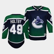 The team's third jersey in 2001, originally colored with red gradients. Braden Holtby Youth Jersey Vancouver Canucks 2021 Reverse Retro Authentic Green Jersey