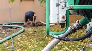 pumping a septic tank costs and