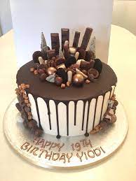 Use chocolate buttons and raisins. Dogum Gunu Pastasi Chocolate Cake Decoration Chocolate Cake Designs Easy Cake Decorating