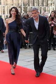 george and amal clooney could not look