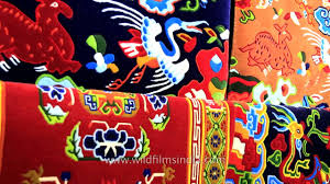 colourful tibetan carpets sold at majnu