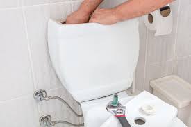 adjust the water level in a toilet bowl