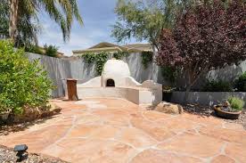 Outdoor Kiva Fireplace With Built In
