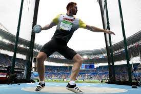 olympic discus qualifying results